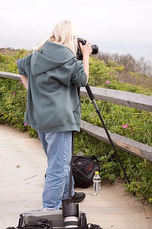 Student with camera on tripod