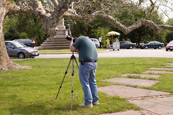 Student composing with camera