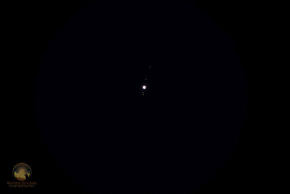 Jupiter and galiliean moons copyright ronaldzinconephotography