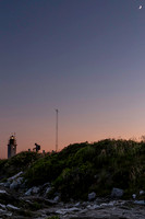 Crescent moon over Beavertail lighthouse copyright ronaldzinconephotography