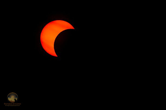 71.8% partial solar eclipse at NKTB.  copyright ronaldzinconephotography