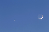 3.7% crescent moon with Venus over Exeter copyright ronzinconephotography