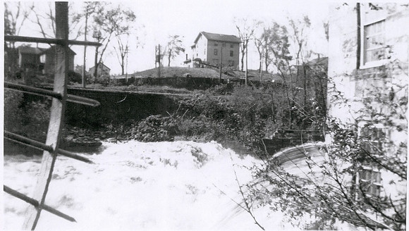 The waterfall, mill one and 7 West Park street on the hilltop.