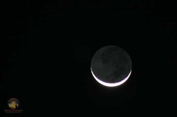 Crescent moon with earthshine Copyright ronaldzinconephotography