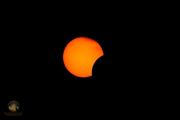 71.8% partial solar eclipse at NKTB.  copyright ronaldzinconephotography