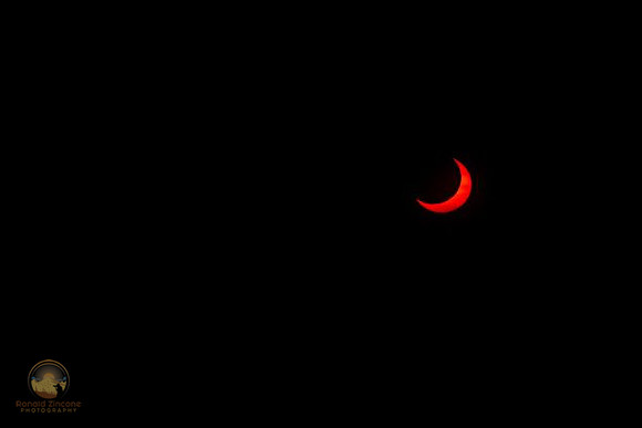 71.8% partial solar eclipse at NKTB.  copyright ronaldzinconephotography