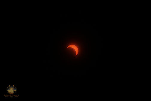 66% Partial solar eclipse over Rhode Island on August 21, 2017 copyright ronaldzinconephotography