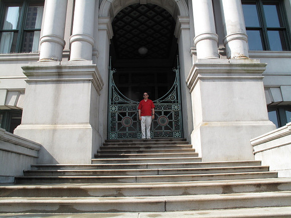 Ronald standing at the top steps of the old Providence City Hall entrance.