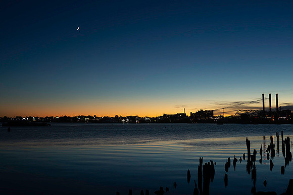 16% cresent moon with jupiter and saturn over India Point Park copyright ronaldzinconephotography