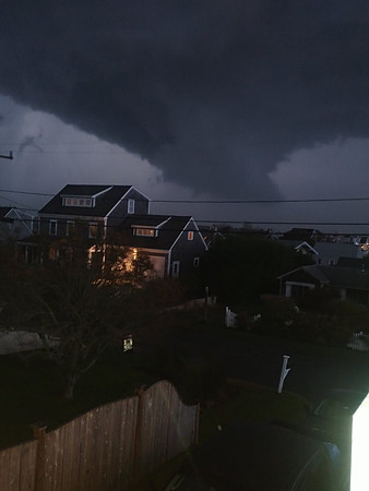 An ominous storm cloud passing over Cape Cod Canal on Tuesday evening