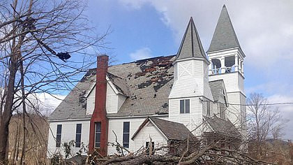 A tornado damaged the roof of a church in Conway, Mass