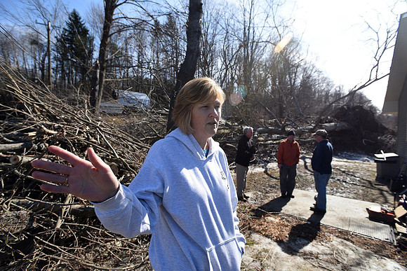 Jeanie Thomas had major tree, roof and car damage done