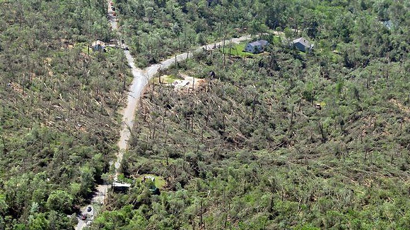 Monson area buildings and forest damaged by the tornado late Wednesday afternoon