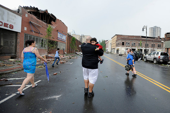 Residents of Springfield, Mass., sought cover Wednesday after a warning about another possible tornado. An earlier storm damaged buildings, toppled trees and caused numerous injuries