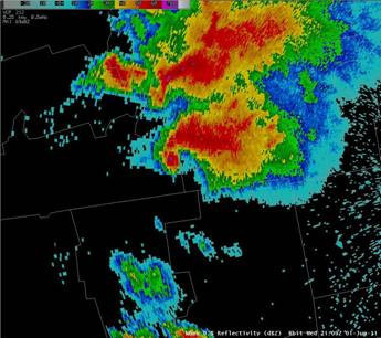 Debris ball seen on radar reflectivity within the hook echo while the tornado was on the ground