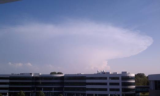 Satellite image of a supercell exiting the Catskills (left), and a picture of the supercell taken out the window of NWS Albany, NY.