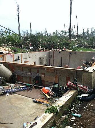 These photos show what a home in Brimfield, MA looked like prior to the tornado and afterwards.