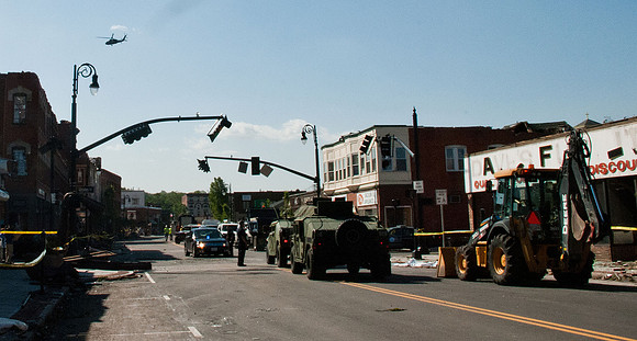 Soldiers of the 747th MP Battalion of the Massachusetts national Guard, work with Springfield and State Police to secure Main Street of Springfield Massachusetts