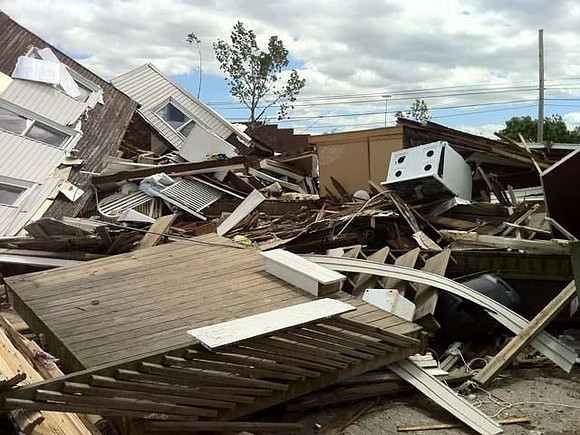 Hundreds of buildings and homes were damaged or destroyed.