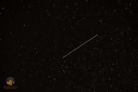 Satellite flyby over frosty drew copyright ronaldzinconephotography