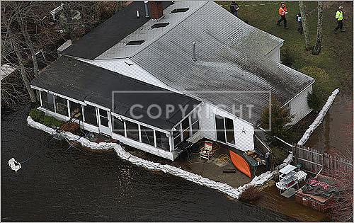 Sandbags surrounded this Lakeville home to help divert the water.