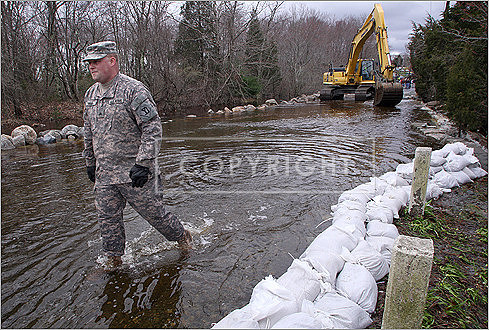 Freetown, National Guardsman Travis Bissey walked on a washed-out Narrows Road