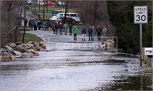 Water covered Narrows Road in Freetown