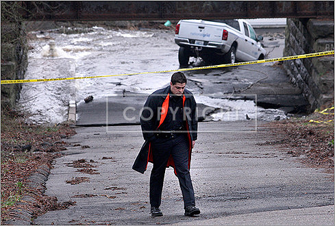 National Grid truck in a sinkhole on Clark Street in Fall River