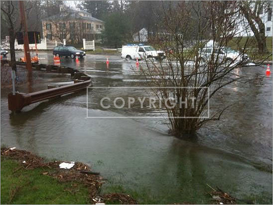 A flooded road in Wayland