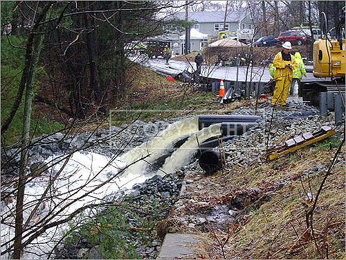 Nearly 65,000 gallons will be pumped from Spectacle Pond over the roadway downstream.