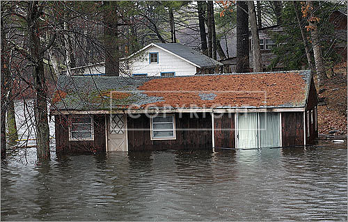 Spectacle Pond flooded and the culvert at Route 119 collapsed. One house on the pond was almost completely submerged.