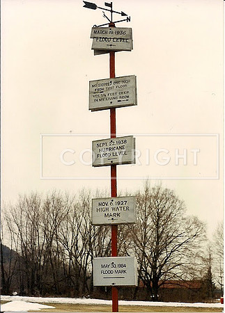 You are here on Route 47, South Hadley, Massachusetts. This Connecticut River Valley town has seen its share of floods, and this weather totem pole brings that point home.