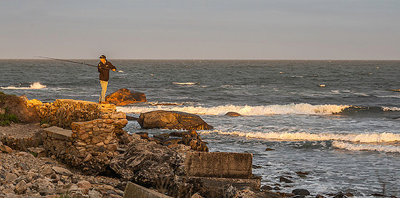 fisherman at Black Point, RI  copyright ronaldzinconephotography