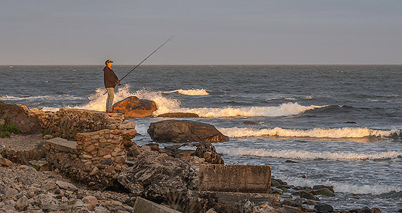 fisherman at Black Point, RI  copyright ronaldzinconephotography