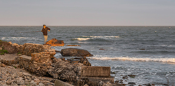 fisherman at Black Point, RI  copyright ronaldzinconephotography