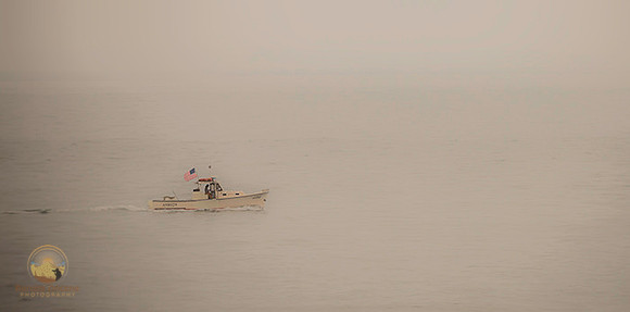 Boat 698029 with American flag  copyright ronaldzinconephotography