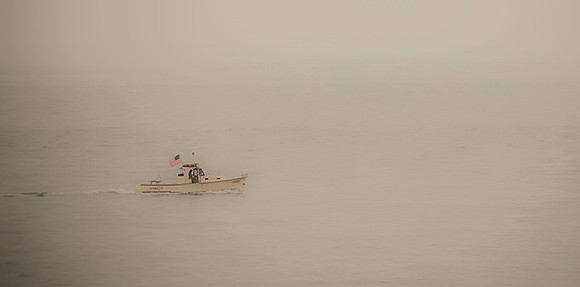 Boat with American flag  copyright ronaldzinconephotography