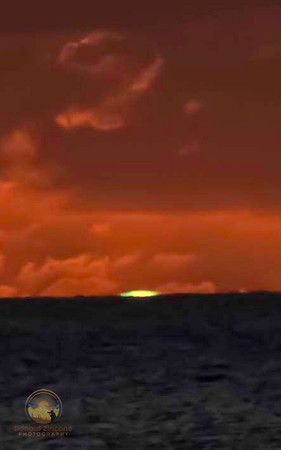 Green flash at Sunset in Aruba copyright ronaldzinconephotography