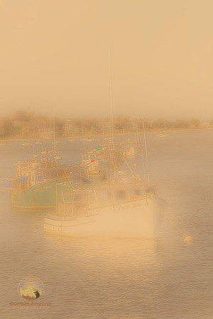 Boats in early morning fog  copyright ronaldzinconephotography