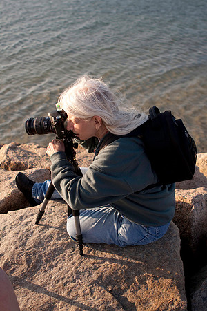 Student Kathleen composing at her camera